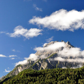 S hlavou v oblacích / Piz Pisoc, Graubünden, Swiss
