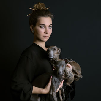 Woman with italian greyhounds
