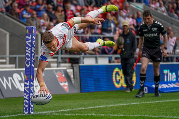 terry-donnelly-sony-alpha-9-rugby-player-leaping-through-the-air-as-he-places-the-ball-down-for-a-try | Megapixel