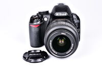 Nikon D3100 + 18-55 mm bazar