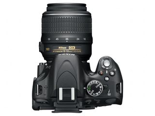 Nikon D5100 + 18-55 mm VR + 55-200 mm VR