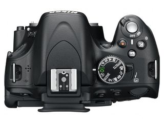 Nikon D5100 + 18-105 mm VR